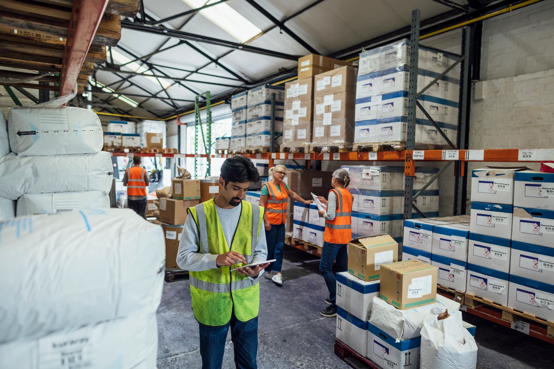 Warehouse logistics team representing supply chain coordination