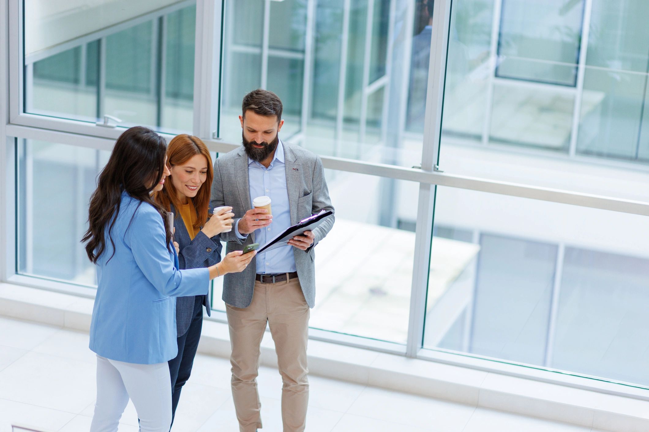 Professionals collaborating in a modern office